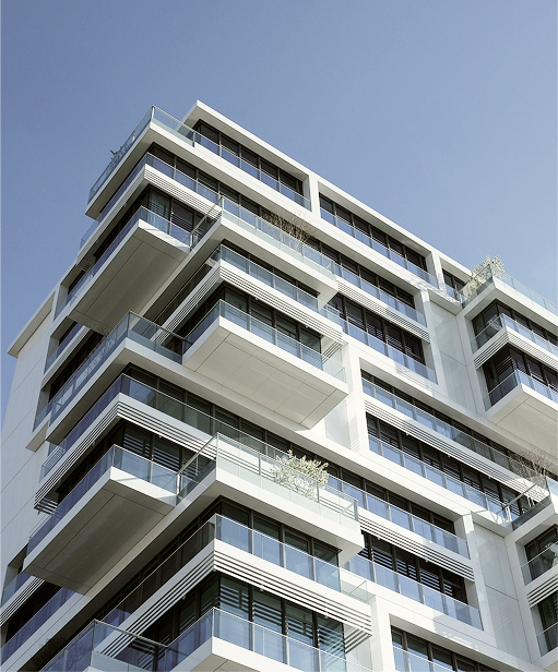 Modern residential building with balconies, symbol of real estate management